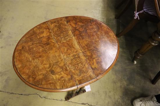 A late Victorian burr walnut Sutherland table, W.52cm, D.15cm, H.53cm